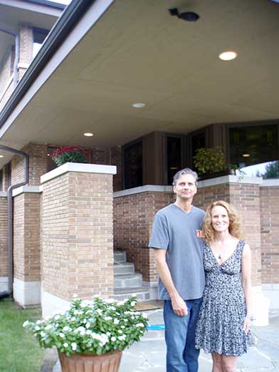 Two Participants in front of the Building